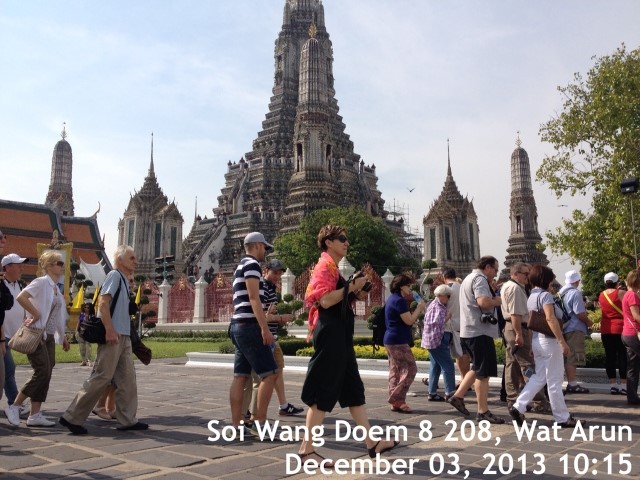 Tourists visiting Wat Arun in Bangkok on 3 December 2013